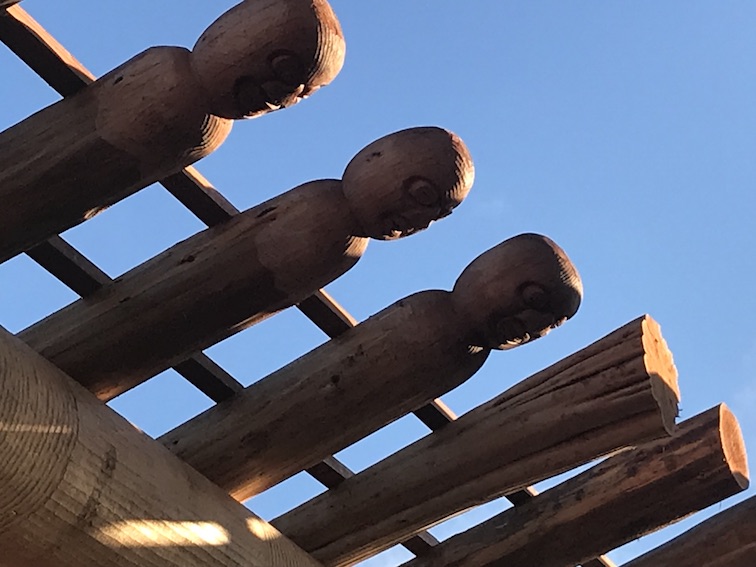 Faces Looking Down at the Smoke Hole